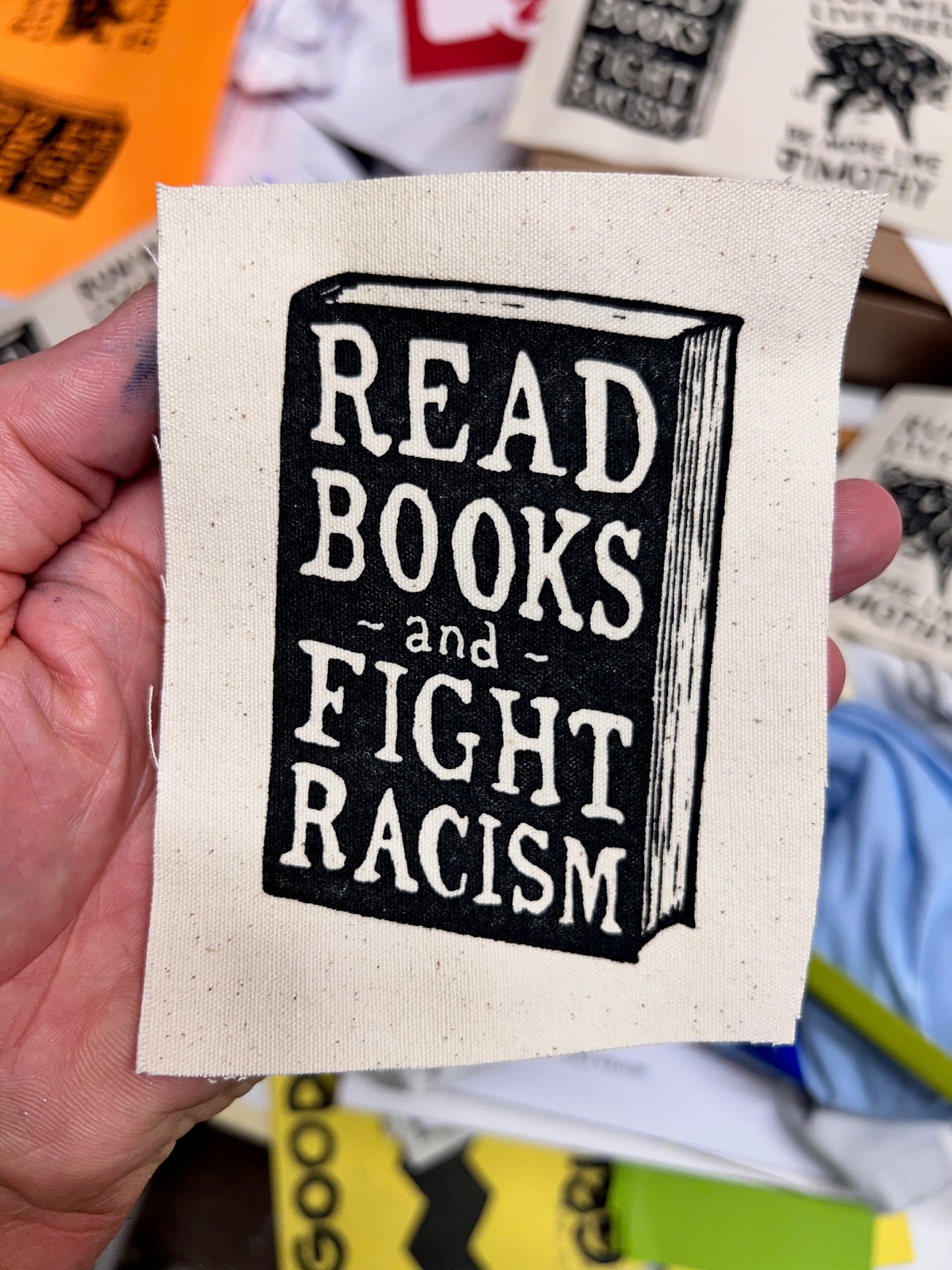 READ BOOKS and FIGHT RACISM - canvas patch - all cotton - 4x5" fabric ink, screen printed
