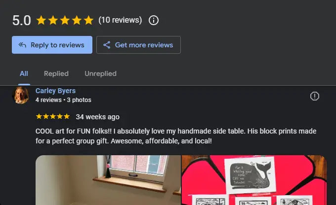 Handmade side table with black and white block prints on red background